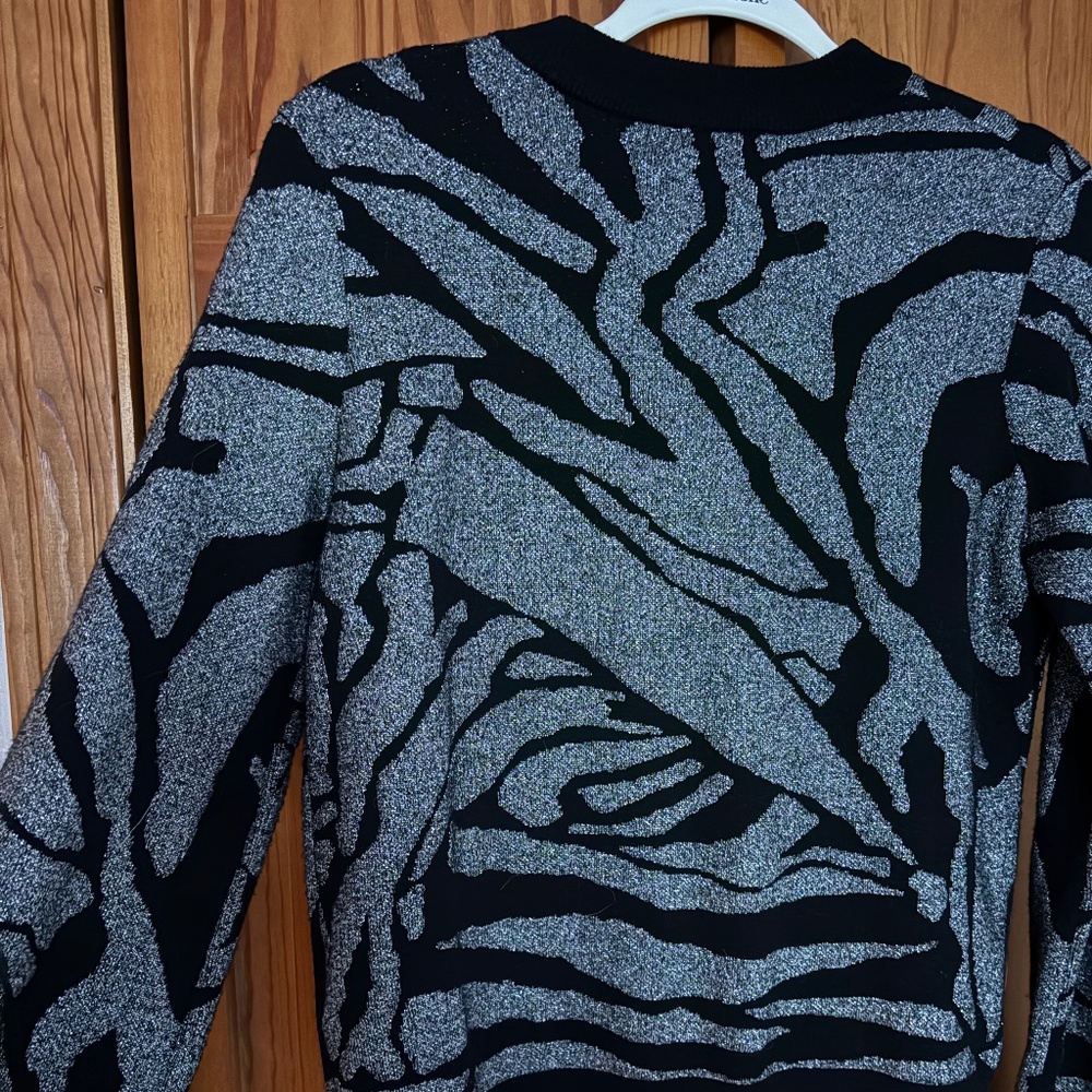 Silver and black bell sleeve sweater